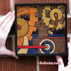 Gears, mini detail 1. 58 paper tiles. $105. Includes framing. Tax-free. 7.5″x7.5″ Very reasonable shipping available.